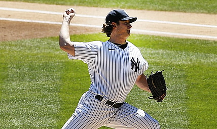 May 6, 2021; Bronx, New York, USA;  New York Yankees starting pitcher Gerrit Cole (45) pitches against the Houston Astros during the first inning at Yankee Stadium. Mandatory Credit: Andy Marlin-USA TODAY Sports