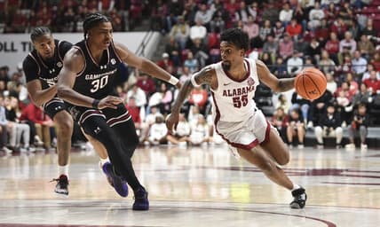 Jan 9, 2024; Tuscaloosa, Alabama, USA;  South Carolina forward Collin Murray-Boyles (30) guards Alabama guard Aaron Estrada during the game Coleman Coliseum. Mandatory Credit: Gary Cosby Jr.-USA TODAY Sports