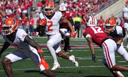 Illinois running back Chase Brown (2) finds a seam during the third quarter of their game Saturday, October 1, 2022 at Camp Randall Stadium in Madison, Wis. Illinois beat Wisconsin 34-10.

Uwgrid01 15
