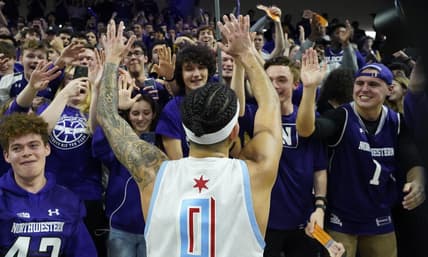Feb 15, 2023; Evanston, Illinois, USA; Northwestern Wildcats guard Boo Buie (0) celebrates his game winning shot against the Indiana Hoosiers at Welsh-Ryan Arena. Mandatory Credit: David Banks-USA TODAY Sports