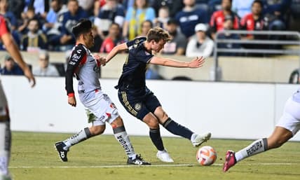 Apr 4, 2023; Chester, PA, USA; Philadelphia Union midfielder Jack McGlynn (16) passes the ball against Atlas FC in the first half at Subaru Park. Mandatory Credit: Kyle Ross-USA TODAY Sports