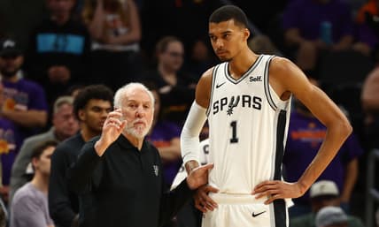 San Antonio Spurs: San Antonio Spurs coach Gregg Popovich with center Victor Wembanyama
