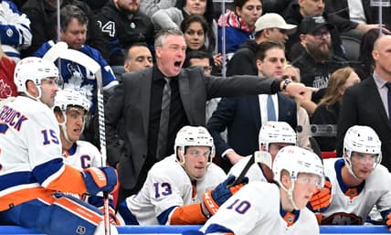 Feb 5, 2024; Toronto, Ontario, CAN;   New York Islanders head coach Patrick Roy gestures as he speaks to his players in the second period against the Toronto Maple Leafs at Scotiabank Arena. Mandatory Credit: Dan Hamilton-USA TODAY Sports
