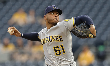 Jul 29, 2021; Pittsburgh, Pennsylvania, USA;  Milwaukee Brewers starting pitcher Freddy Peralta (51) delivers a pitch against the Pittsburgh Pirates during the first inning at PNC Park. Mandatory Credit: Charles LeClaire-USA TODAY Sports