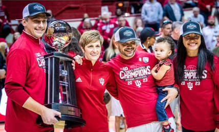 Indiana coaches, from left, Associate Head Coach Rhet Wierzba, Head Coach Teri Moren, Associate Head Coach Glenn Box, and Assistant Coach and Recruiting Coordinator Linda Sayavongchanh pose with the Big Ten Championship Trophy after the second half of the Indiana versus Purdue women's basketball game at Simon Skjodt Assembly Hall on Sunday, Feb. 19, 2023.

Iu Pu Wbb Pg Coaches Trophy Pose