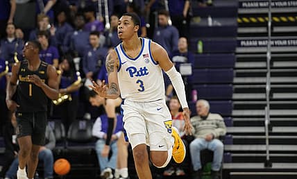Nov 28, 2022; Evanston, Illinois, USA; Pittsburgh Panthers guard Greg Elliott (3) celebrates a three point basket against the Northwestern Wildcats during the second half at Welsh-Ryan Arena. Mandatory Credit: David Banks-USA TODAY Sports