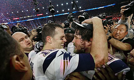 In 2017 Tom Brady celebrates with center David Andrews after the game.