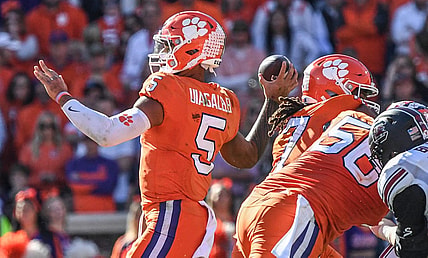 Nov 26, 2022; Clemson, SC, USA;  Clemson quarterback D.J. Uiagalelei (5) passes against South Carolina during the second quarter at Memorial Stadium in Clemson, South Carolina on Saturday, Nov. 26, 2022.    Mandatory Credit: Ken Ruinard-USA TODAY Sports