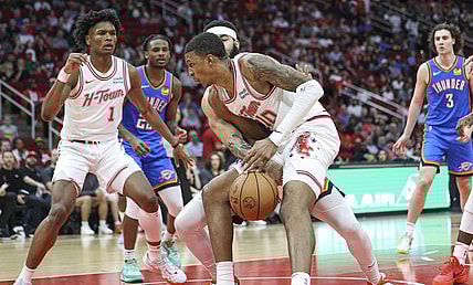 Feb 25, 2024; Houston, Texas, USA; Houston Rockets forward Jabari Smith Jr. (10) loses control of the ball during the second quarter against the Oklahoma City Thunder at Toyota Center. Mandatory Credit: Troy Taormina-USA TODAY Sports