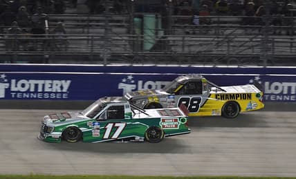 Jun 18, 2021; Nashville, TN, USA; NASCAR Truck Series driver Ryan Preece (17) passes NASCAR Truck Series driver Grant Enfinger (98) in the final stage of the Rackley Roofing 200 at Nashville Superspeedway. Mandatory Credit: Christopher Hanewinckel-USA TODAY Sports