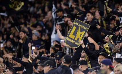 Mar 23, 2019; Los Angeles, CA, USA; A sign with the Los Angeles FC logo is held by a fan in the stands during the second half against the Real Salt Lake at Banc of California Stadium. Mandatory Credit: Orlando Ramirez-USA TODAY Sports