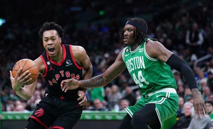 Apr 5, 2023; Boston, Massachusetts, USA; Toronto Raptors forward Scottie Barnes (4) drives the ball against Boston Celtics center Robert Williams III (44) in the second quarter at TD Garden. Mandatory Credit: David Butler II-USA TODAY Sports