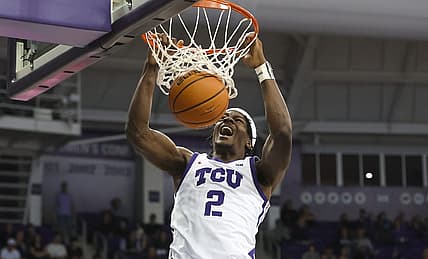 Dec 28, 2022; Fort Worth, Texas, USA;  TCU Horned Frogs forward Emanuel Miller (2) dunks during the second half against the Central Arkansas Bears at Ed and Rae Schollmaier Arena. Mandatory Credit: Kevin Jairaj-USA TODAY Sports