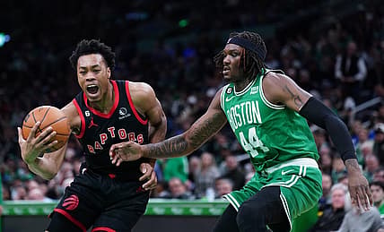 Apr 5, 2023; Boston, Massachusetts, USA; Toronto Raptors forward Scottie Barnes (4) drives the ball against Boston Celtics center Robert Williams III (44) in the second quarter at TD Garden. Mandatory Credit: David Butler II-USA TODAY Sports