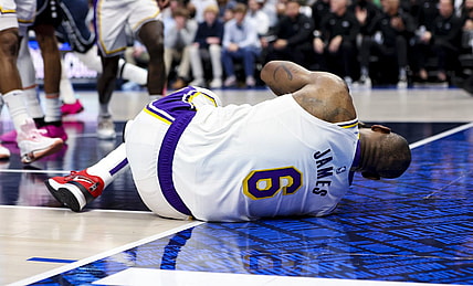 Feb 26, 2023; Dallas, Texas, USA; Los Angeles Lakers forward LeBron James (6) lays on the floor injured during the second half against the Dallas Mavericks at American Airlines Center. Mandatory Credit: Kevin Jairaj-USA TODAY Sports