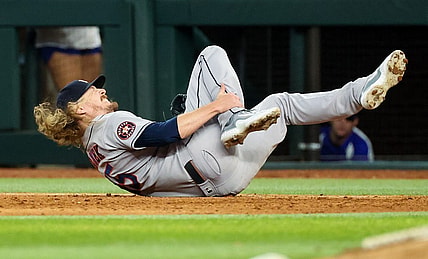 Sep 4, 2023; Arlington, Texas, USA;  Houston Astros relief pitcher Ryne Stanek (45) injures himself during the ninth inning against the Texas Rangers at Globe Life Field. Mandatory Credit: Kevin Jairaj-USA TODAY Sports