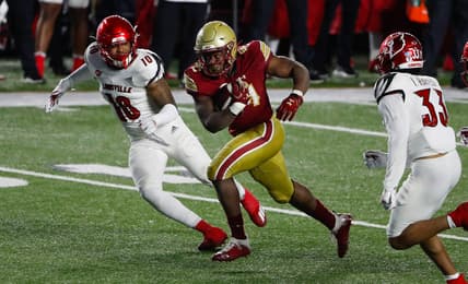 Nov 28, 2020; Chestnut Hill, Massachusetts, USA; Boston College Eagles running back Pat Garwo III (24) runs against the Louisville Cardinals during the second half at Alumni Stadium. Mandatory Credit: Winslow Townson-USA TODAY Sports