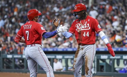 Jun 18, 2023; Houston, Texas, USA; Cincinnati Reds first baseman Spencer Steer (7) celebrates with shortstop Elly De La Cruz (44) after hitting a home run during the sixth inning against the Houston Astros at Minute Maid Park. Mandatory Credit: Troy Taormina-USA TODAY Sports