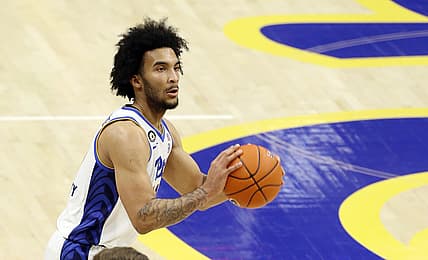 Mar 2, 2021; Pittsburgh, Pennsylvania, USA; Pittsburgh Panthers forward Justin Champagnie (11) shoots a three-point basket against the Wake Forest Demon Deacons during the second half at the Petersen Events Center. Mandatory Credit: Charles LeClaire-USA TODAY Sports