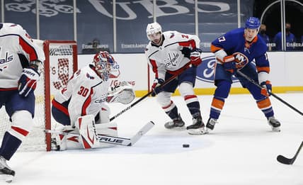Apr 1, 2021; Uniondale, New York, USA; Washington Capitals goaltender Ilya Samsonov (30) makes a save against the New York Islanders during the second period at Nassau Veterans Memorial Coliseum. Mandatory Credit: Andy Marlin-USA TODAY Sports