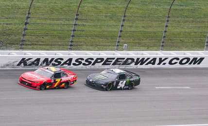 Oct 23, 2021; Kansas City, MO, USA; NASCAR Xfinity Series driver Justin Allgaier (7) and driver Ty Gibbs (54) round turn two during the Kansas Lottery 300 at Kansas Speedway. Mandatory Credit: Denny Medley-USA TODAY Sports