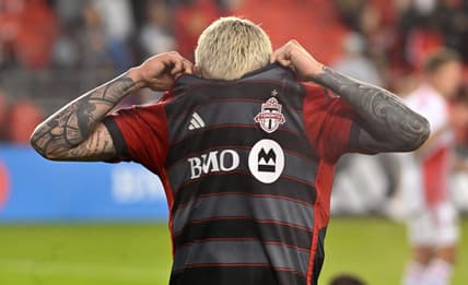 May 6, 2023; Toronto, Ontario, CAN;  Toronto FC midfielder Federico Bernardeschi (10) pulls his shirt over his face after a 2-0 defeat against the New England Revolution at BMO Field. Mandatory Credit: Dan Hamilton-USA TODAY Sports