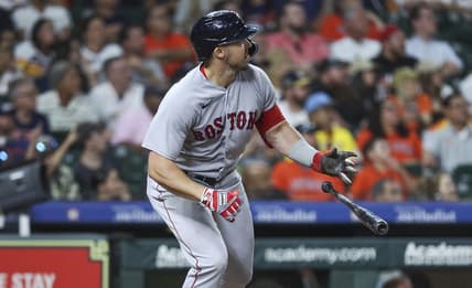 Aug 23, 2023; Houston, Texas, USA; Boston Red Sox center fielder Adam Duvall (18) hits a three-run home run during the tenth inning against the Houston Astros at Minute Maid Park. Mandatory Credit: Troy Taormina-USA TODAY Sports
