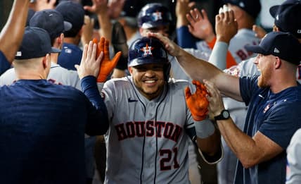 Sep 4, 2023; Arlington, Texas, USA; Houston Astros catcher Yainer Diaz (21) celebrates with teammates after hitting a three-run home run during the seventh inning against the Texas Rangers at Globe Life Field. Mandatory Credit: Kevin Jairaj-USA TODAY Sports