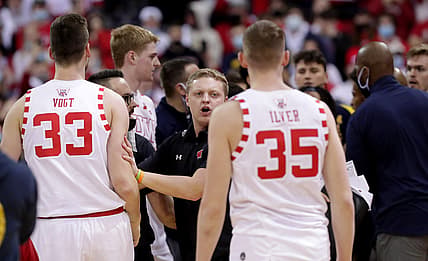 Wisconsin and Michigan players and coaches are involved in a scuffle with Michigan head coach Juwan Howard during the waning moments of their game Sunday, February 20, 2022 at the Kohl Center in Madison, Wis. Wisconsin beat Michigan 77-63.

Uwmen21 26