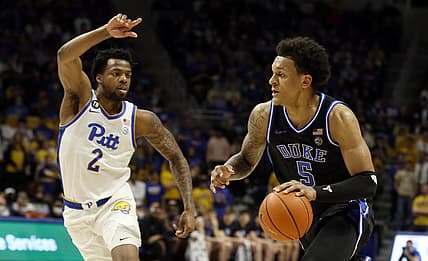 Mar 1, 2022; Pittsburgh, Pennsylvania, USA;  Duke Blue Devils forward Paolo Banchero (5) drives to the basket against Pittsburgh Panthers guard Femi Odukale (2) during the first half at the Petersen Events Center. Mandatory Credit: Charles LeClaire-USA TODAY Sports