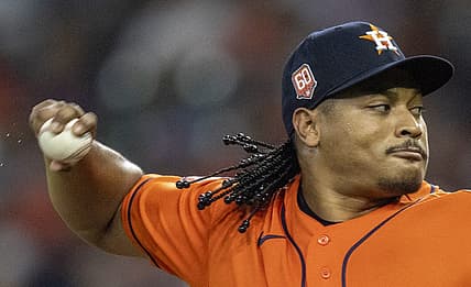 Aug 12, 2022; Houston, Texas, USA; Houston Astros starting pitcher Luis Garcia (77) pitches against the Oakland Athletics in the second inning at Minute Maid Park. Mandatory Credit: Thomas Shea-USA TODAY Sports