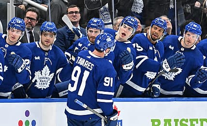 Feb 5, 2024; Toronto, Ontario, CAN;   Toronto Maple Leafs forward John Tavares (91) celebrates with team mates at the bench after scoring a goal against the New York Islanders in the third period at Scotiabank Arena. Mandatory Credit: Dan Hamilton-USA TODAY Sports