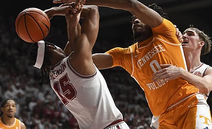 Mar 2, 2024; Tuscaloosa, Alabama, USA;  Alabama forward Jarin Stevenson (15) and Tennessee forward Jonas Aiddo (0) fight for a rebound that gets knocked out of bounds at Coleman Coliseum. Mandatory Credit: Gary Cosby Jr.-USA TODAY Sports