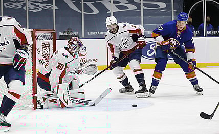 Apr 1, 2021; Uniondale, New York, USA; Washington Capitals goaltender Ilya Samsonov (30) makes a save against the New York Islanders during the second period at Nassau Veterans Memorial Coliseum. Mandatory Credit: Andy Marlin-USA TODAY Sports