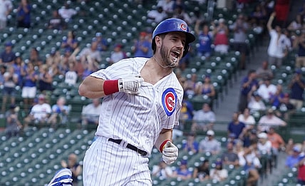 Aug 25, 2021; Chicago, Illinois, USA; Chicago Cubs third baseman Patrick Wisdom (16) runs the bases after hitting a three run home run against the Colorado Rockies during the fifth inning in game one of a doubleheader at Wrigley Field. Mandatory Credit: David Banks-USA TODAY Sports