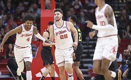 Jan 20, 2024; Houston, Texas, USA; Houston Rockets center Alperen Sengun (28) smiles after scoring a basket during the second quarter against the Utah Jazz at Toyota Center. Mandatory Credit: Troy Taormina-USA TODAY Sports