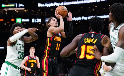 Mar 1, 2022; Boston, Massachusetts, USA; Atlanta Hawks guard Trae Young (11) shoots against the Boston Celtics in the second quarter at TD Garden. Mandatory Credit: David Butler II-USA TODAY Sports