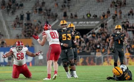 Sep 24, 2022; Tempe, Arizona, USA; Utah Utes defensive tackle Junior Tafuna (58) celebrates after tackling Arizona State Sun Devils quarterback Emory Jones (5) during the second half at Sun Devil Stadium. Mandatory Credit: Joe Camporeale-USA TODAY Sports
