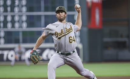 May 19, 2023; Houston, Texas, USA; Oakland Athletics starting pitcher Ken Waldichuk (64) delivers a pitch during the first inning against the Houston Astros at Minute Maid Park. Mandatory Credit: Troy Taormina-USA TODAY Sports