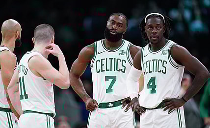 Feb 1, 2024; Boston, Massachusetts, USA; Boston Celtics guard Jrue Holiday (4), guard Jaylen Brown (7), guard Payton Pritchard (11) and guard Derrick White (9) on the court against the Los Angeles Lakers in the second half at TD Garden. Mandatory Credit: David Butler II-USA TODAY Sports