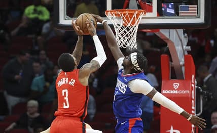 Nov 2, 2022; Houston, Texas, USA; Los Angeles Clippers guard Reggie Jackson (1) attempts to strip the ball from Houston Rockets guard Kevin Porter Jr. (3) during the first quarter at Toyota Center. Mandatory Credit: Troy Taormina-USA TODAY Sports
