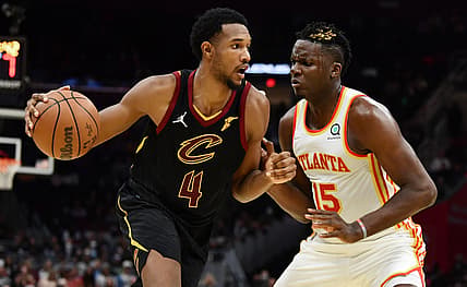 Oct 23, 2021; Cleveland, Ohio, USA; Cleveland Cavaliers center Evan Mobley (4) drives to the basket against Atlanta Hawks center Clint Capela (15) during the second half at Rocket Mortgage FieldHouse. Mandatory Credit: Ken Blaze-USA TODAY Sports