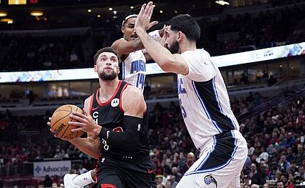 Nov 17, 2023; Chicago, Illinois, USA; Orlando Magic guard Gary Harris (14) defends Chicago Bulls guard Zach LaVine (8) during the first half at United Center. Mandatory Credit: David Banks-USA TODAY Sports