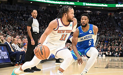 Dec 5, 2023; Milwaukee, Wisconsin, USA; New York Knicks guard Jalen Brunson (11) drives to the basket against Milwaukee Bucks guard Malik Beasley (5) in the first half at Fiserv Forum. Mandatory Credit: Michael McLoone-USA TODAY Sports