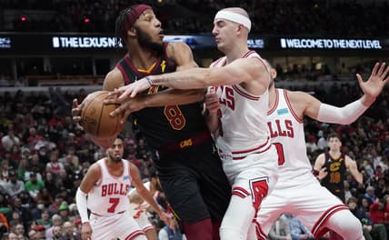 Mar 12, 2022; Chicago, Illinois, USA; Chicago Bulls guard Alex Caruso (6) defends Cleveland Cavaliers forward Lamar Stevens (8) during the second half at United Center. Mandatory Credit: David Banks-USA TODAY Sports