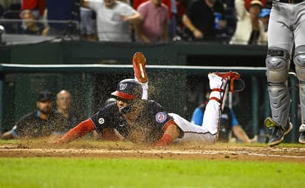 Sep 16, 2022; Washington, District of Columbia, USA; Washington Nationals first baseman Joey Meneses (45) slides into home for a home run against the Miami Marlins during the seventh inning at Nationals Park. Mandatory Credit: Brad Mills-USA TODAY Sports