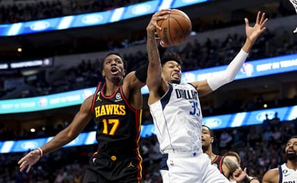 Jan 18, 2023; Dallas, Texas, USA;  Dallas Mavericks forward Christian Wood (35) and Atlanta Hawks forward Onyeka Okongwu (17) go for the loose ball during the first quarter at American Airlines Center. Mandatory Credit: Kevin Jairaj-USA TODAY Sports