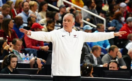 Mar 8, 2023; Greensboro, NC, USA; Virginia Tech Hokies head coach Mike Young signal to his players against the North Carolina State Wolfpack during the first half of the second round of the ACC tournament at Greensboro Coliseum. Mandatory Credit: John David Mercer-USA TODAY Sports