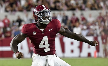 Sep 9, 2023; Tuscaloosa, Alabama, USA;  Alabama Crimson Tide quarterback Jalen Milroe (4) celebrates after hitting Alabama Crimson Tide wide receiver Jermaine Burton (3) for a touchdown at Bryant-Denny Stadium. Texas defeated Alabama 34-24. Mandatory Credit: Gary Cosby Jr. -USA TODAY Sports