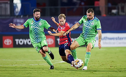 Sep 16, 2023; Frisco, Texas, USA;  Seattle Sounders midfielder Joao Paulo (6) and Seattle Sounders forward Jordan Morris (13) battle for the ball with FC Dallas midfielder Paxton Pomykal (19) during the first half at Toyota Stadium. Mandatory Credit: Kevin Jairaj-USA TODAY Sports